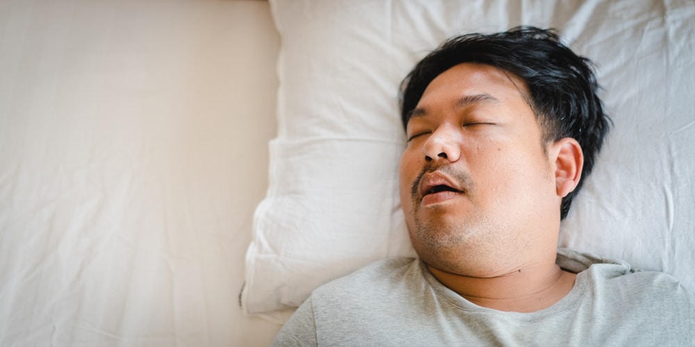 Asian,Man,Sleeping,On,Bed,With,Snore,Face.concept,Of,Snoring.healthcare 1765403601 e340bed4d87c4a24bc039074ca73943d 1